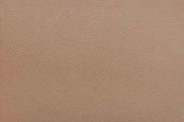 Fototapeta premium A vibrant, abstract textile artwork. A close-up view of a textured surface composed of numerous, softly rounded, fabric-covered forms. The forms vary in size and subtly different shades of color