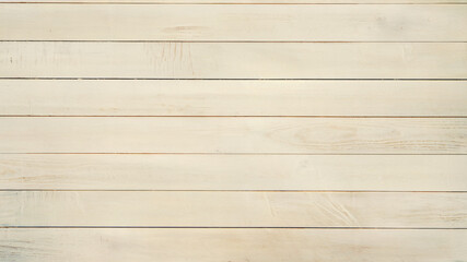 Light wooden plank background with natural texture.