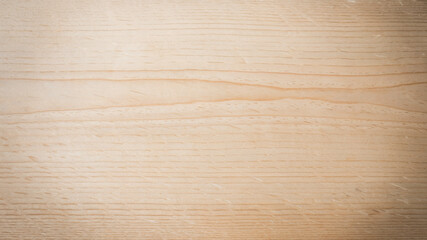 Naklejka premium Light wooden surface with clean grain pattern and natural texture.