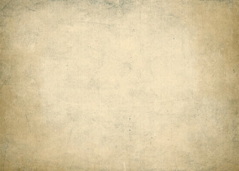Antique vintage paper  background. Old worn ragged parchment sheet. Ancient brown faded texture