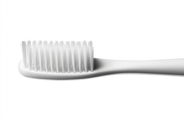 close up of a white toothbrush head with soft bristles on a white background
