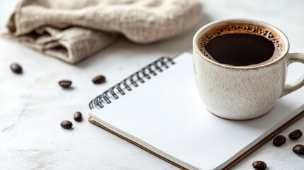 Morning coffee and notebooks create a cozy workspace for inspiration and creativity