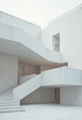 Obraz premium Modern White Building with Minimalist Design and Monochromatic Color Scheme