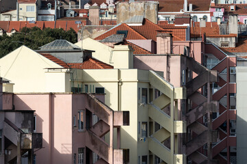 Close-up of faded coloured apartment building facades in Lisbon