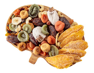 Mix of dried tropical fruits, nuts, and raisins isolated on a white background.