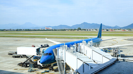 Process of Pre-flight service and handling. Luggage and catering loading at International Airport.