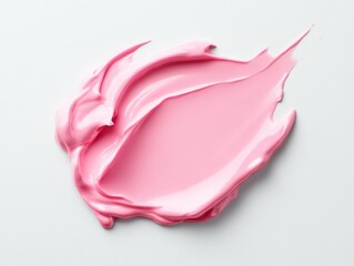 smear of pink paint, cream, or cosmetic product on a white background