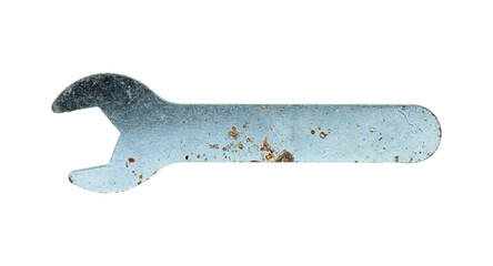 Worn metal wrench lying on a white background