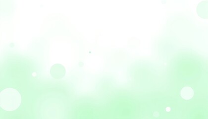 Obraz premium Soft green bokeh background with white highlights