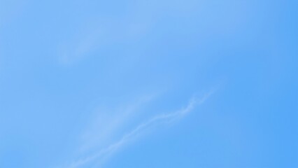 Serene Light Blue Sky with Delicate Cirrus Clouds - Background Texture