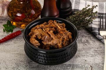 Shredded slow cooked pork meat