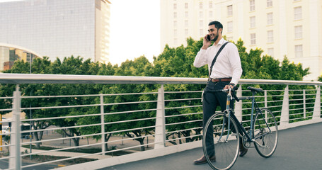 Bike, bridge and phone call with employee man outdoor for communication or travel to work. Carbon neutral, city and conversation with happy business person in urban town for commute or update