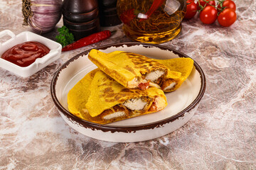 Spicy quesadillas with chicken fillet