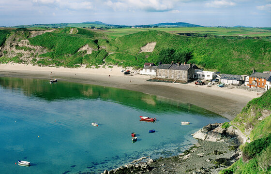 The sheltered beach and cove of Porth Dinllaen faces the Irish Sea on the Llyn Peninsula, Gwynedd, north west Wales, UK