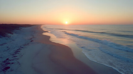 Stunning Sunset over Sandy Beach and Ocean Waves