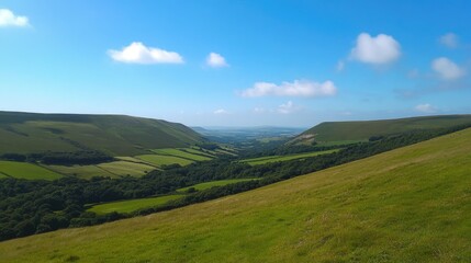 Naklejka premium Lush Green Valley Under a Bright Blue Sky