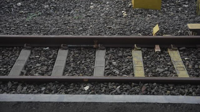 Empty railroad tracks without trains.