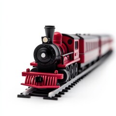 red and black toy train on tracks