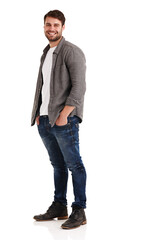 Portrait, man and smile with confidence in studio for casual fashion, trendy style and western aesthetic. Happy, person and hands in pocket with clothes, confident and upcycling on white background