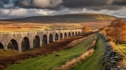 Obraz premium Stone Aqueduct Stretches Across Autumnal Yorkshire Landscape