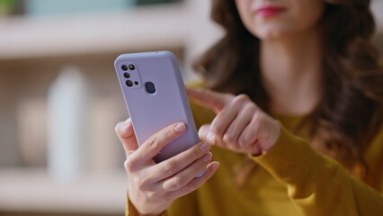 Manager hand touching cellphone screen making online order at office closeup.