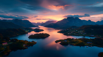 Sunset over fjord, coastal village, mountains, aerial view, travel