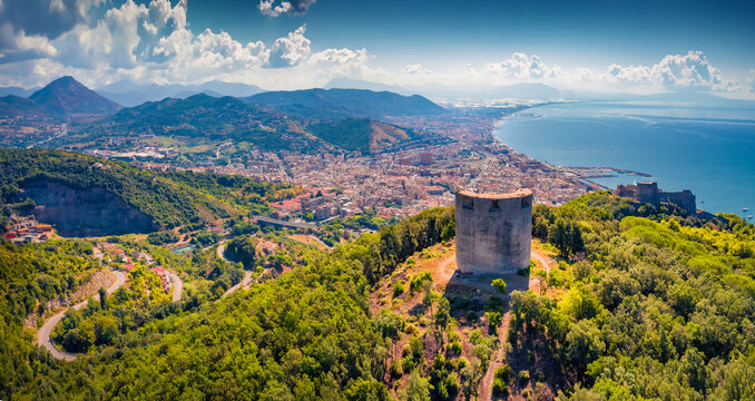 Astonishing summer view from flying drone of Bastiglia tower and Arechi Castle. Spectacular morning cityscape of Salerno town, Italy, Europe. Traveling concept background.