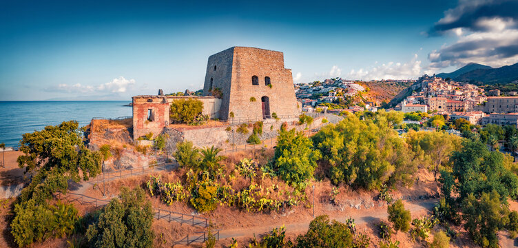 Adorable  summer view from flying drone of historical place - Talao Tower. Attractive morning cityscape of Scalea town, Province of Cosenza, Italy. Vacation concept background.
