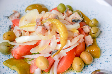 Mediterranean salad with olives onion tomato and pepper Spain