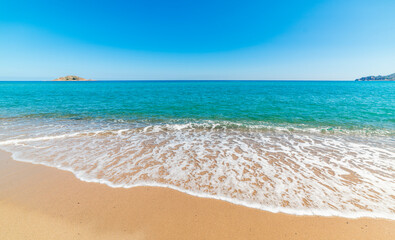 Blue sea and golden sand in Sardinia