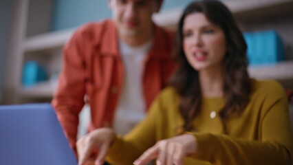Teammates brainstorming video call in coworking space closeup. Smiling man woman