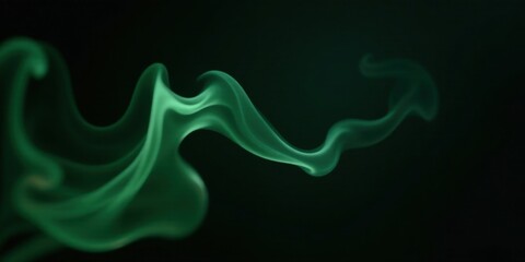 Obraz premium Abstract Emerald Green Smoke Swirls on Dark Background, Creating an Ethereal and Mysterious Atmosphere