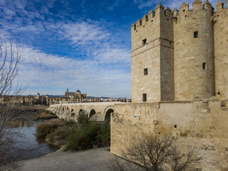 View of Calahorra tower a fortified gate in the historic center of Córdoba, Spain. The edifice is of Islamic origin guarding the Roman bridge