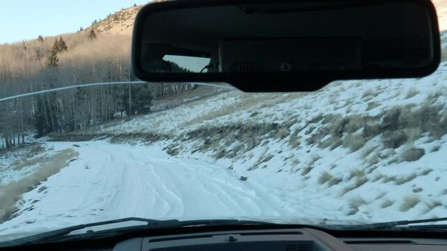 Driving Down a Winter Road on Mount Taylor NM