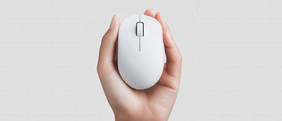 hand holding a modern wireless computer mouse