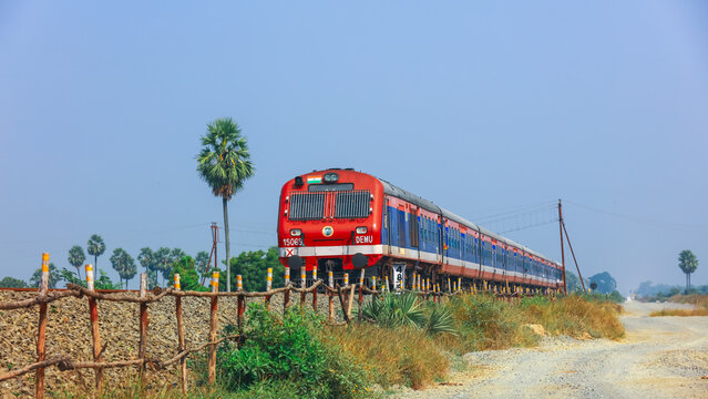 DEMU passenger train in rural Andhra Pradesh, serve short and medium-distance routes in India.