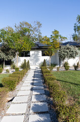 Landscape design in a modern style for a house in white