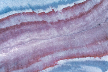 Aerial view of colorful sandstone landscape patterns