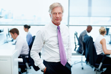 Portrait, mature or businessman in office as manager or leader with team for growth or project...