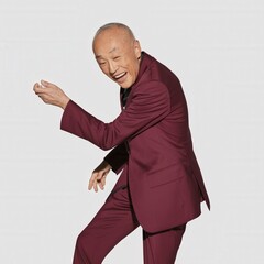 Joyful Older Asian Man Burgundy Suit Celebrating New Year Success