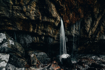 water falling from a cliff