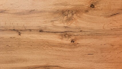 Fototapeta premium A wooden surface with a grainy texture