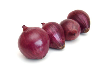 Stack red onion on white background