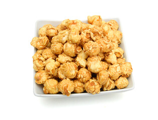 Caramel popcorn on a white background