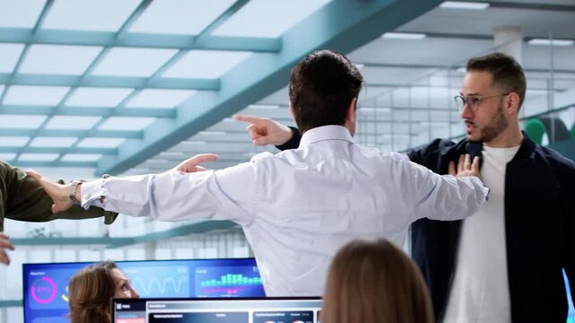 Man Intervening Office Conflict