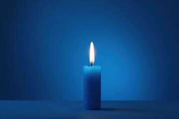 Single blue candle flame, vibrant blue backdrop, celebration, minimalist