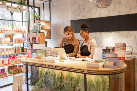 Team collaboration in vibrant cosmetics store environment