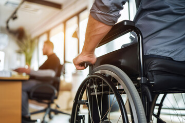 Obraz premium Person using a wheelchair presenting ideas, gesturing confidently to colleagues in a modern office