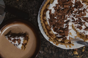 Chocolate Cream banoffee Pie with Slice on Plate