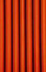 Textur Rot, orange. Linien und Streifen in Bewegung. vertikal